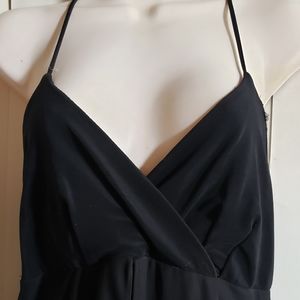 Black evening dress with ruffled see thru skirt